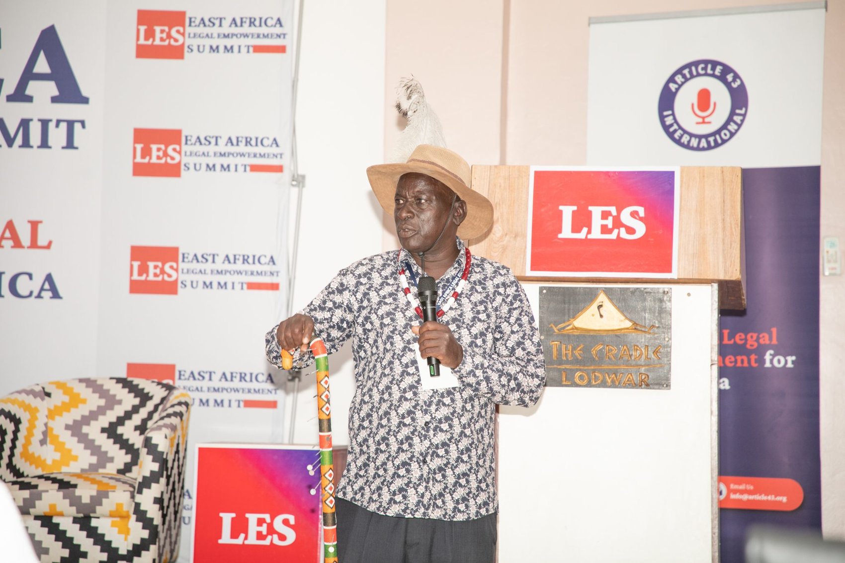 Elder speaking at LES25