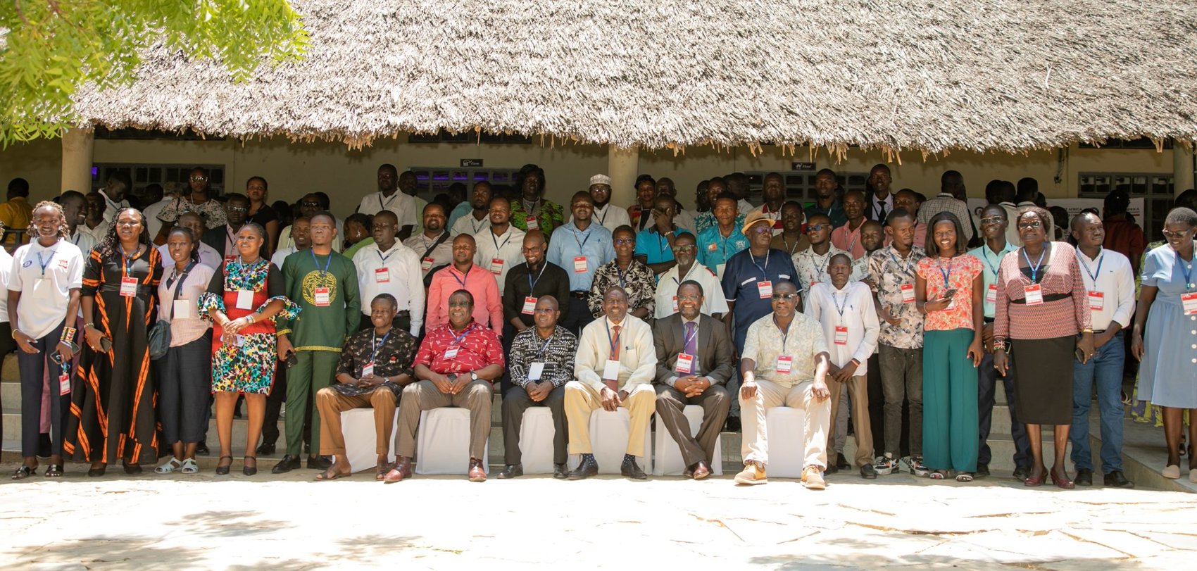 LES25 participants in a group photograph outside the venue